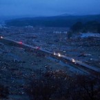 Vehicles pass through an apocalyptic scene - this is what is left of the city of Minamisanriku in northeastern Japan. (AP Photo/David Guttenfelder)