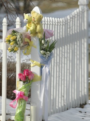 File photo of flowers left outside the home of the Prince family in Massachusetts.