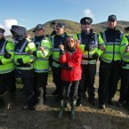 Shell to Sea activist Maura Harrington leans on gardai at the Shell plant at Glengad beach in Co Mayo in 2009.