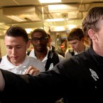 Shamock Rovers' Gary Twigg (r) shakes hands with fans as (l-r) Billy Dennehy and goalkeeper Ryan Thompson follow behind.