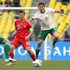 Russia's Andrey Arshavin and Keith Andrews.