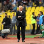 Trap paces the touchline.