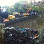 A massive amount of debris has to be moved from the River Dodder by machine. Image: Frank Gallen