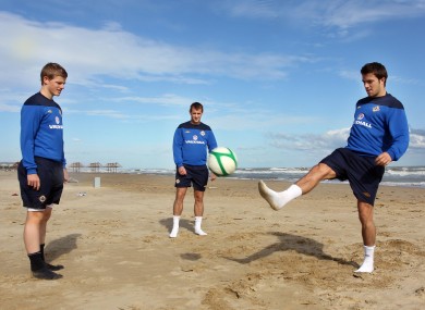 Northern Ireland's Andrew Little, Niall McGinn and Johnny Gorman play keepy-uppy on the beach in Pescara yesterday. Northern Ireland take on Italy tonight.