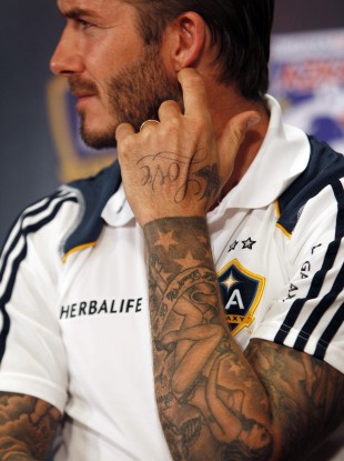 David Beckham at a news conference in Manila earlier.