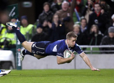 Luke Fitzgerald dives over for a try. The winger scored twice as Leinster cruised to a 52-27 win over Bath.