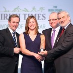 Taoiseach Enda Kenny presents the Sportswoman of the Year award to Nina, alongside Irish Times editor Kevin O'Sullivan and Kieran Mulvey, chairman of the Irish Sports Council.

