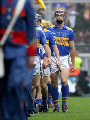 Paul Curran and his Tipperary team-mates parade ahead of their All-Ireland win in 2010.