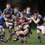 Newbridge's Charlie Ryan is held up by the Wilson's Hospital defence during the Vinnie Murray Cup clash. 