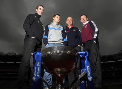 Donegal manager Jim McGuinness, Dublin footballer Kevin McManamon, Cork manager Conor Counihnan and Galway manager Alan Mullholland at yesterday's Allianz National Football League launch.