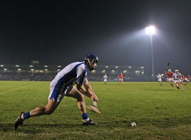 Waterford's Jamie Nagle takes a sideline cut against Cork.