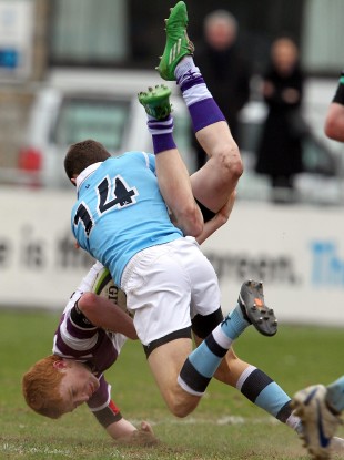 St. Michael’s Jack Kelly is sent off for this tackle on Conor Murray of Clongowes.