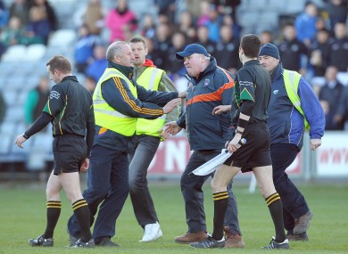 Armagh Assistant manager Paul Grimley confronts referee Michael Duffy after Sunday's game.