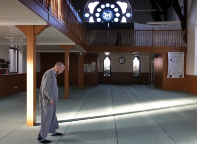 A man prepares to pray in the Dublin Mosque on South Circular Road