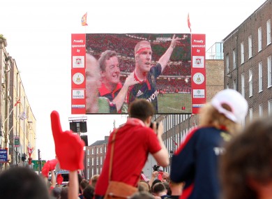 Munster fans celebrate in O'Connell st, Limerick, watching a victorious Paul O'Connell in 2008.