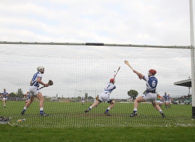 Laois keeper Eoin Reilly saves a penalty against Carlow.
