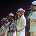 When the foursome performed for the first time after member Bryan McFadden left the group, they all donned white. In celebration?