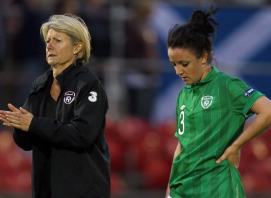 Ireland manager Sue Ronan and Sophie Perry dejected after the game.