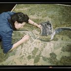 The photographer of this image of a camouflage class at New York University was also a women, Marjory Collins. 