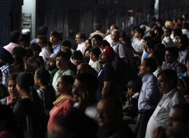 Stranded passengers wait for power to be restored at New Delhi railway station.