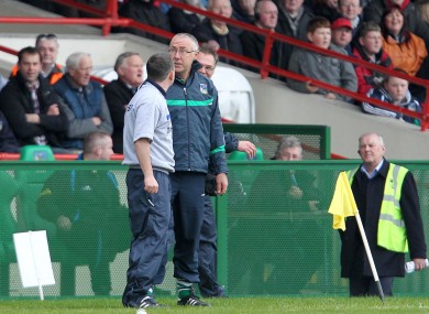 Limerick's John Allen and and Davy Fitzgerald of Clare argue on the sideline during their match in April.