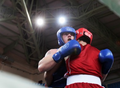 Controversy: Ward, blue, in action against Muzaffer during the Olympic qualifiers.