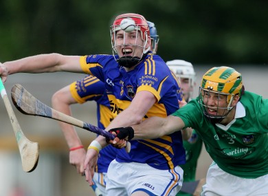 Limerick's Dan Morrissey and Denis Maher of Tipperary battle for possession.