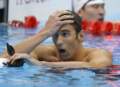 Phelps reacts with horror to his heat time.