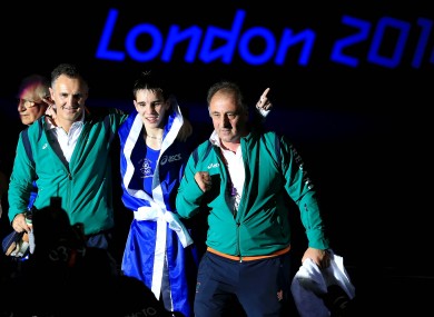 Michael Conlan celebrates with his corner.