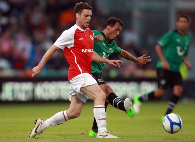 John Russell with Sergio Da Silva Pinto of Hannover.