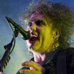 Robert Smith of The Cure performs on the main stage at Electric Picnic last night. Photo: Andres Poveda