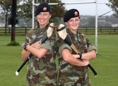 Corporal Gemma O'Connor (Cork), left, pictured with Private Shelly Keogh (Wexford). Both soldiers will be representing their counties in the Camogie All-Ireland this year.