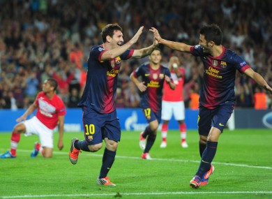 There is no falling out between Barcelona's Lionel Messi and David Villa according to their coach.