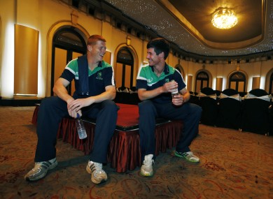 Ireland's cricketers Kevin O'Brien, left, and George Dockerell wait in the team hotel.