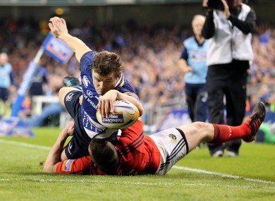Leinster's Brian O'Driscoll scores a try against Munster.