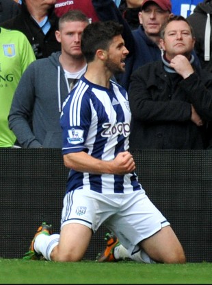 Long celebrates scoring.