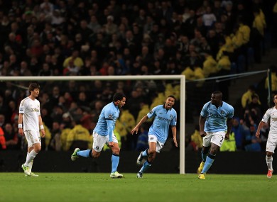 Tevez scores for City.
