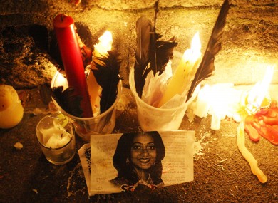 Candles are left in tribute outside Leinster House in Dublin, after thousands of people marched demanding legislation on abortion after the death of Indian woman Savita Halappanavar.