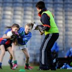 Gaelscoil Chnoc Liamhna's Niamh Ni Liathain with Caitlin Guiden of St Oliver Plunkett's, Malahide.