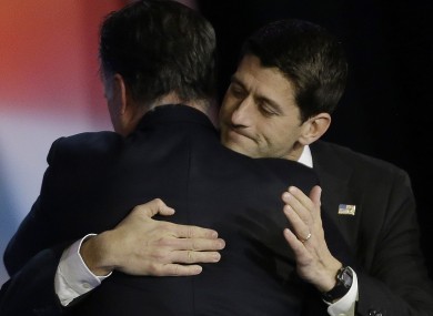 Paul Ryan (right) embraces MItt Romney after the latter conceded defeat in last night's Presidential election.