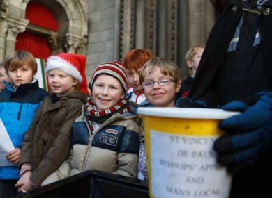 Children from Kildare Place School singingfor the annual Black Santa Christmas charity.