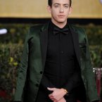 Kevin McHale goes green, and sleeveless for some reason? (Photo by Chris Pizzello/Invision/AP)