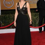 Jane Lynch is chaperoning the Glee prom ins scary dominatrix gear. There may be notes from parents coming. 
