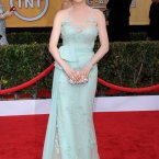 Ellie Kemper's mint ensemble looks a little ice-skating championships on top and mother of the bride on the bottom. But, girl has some good pale skin. (© Vince Flores / AFF-USA.COM)