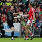 But it is Cork's Alan O'Connor who steps in to clear the pitch and offloads to the linesman.