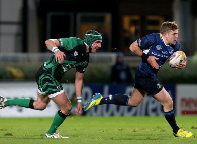 Dave McSharry chases Ian Madigan.