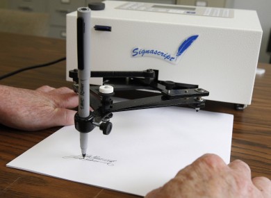 File photo of an 'autopen' device, one of which was used by Obama to sign the 'fiscal cliff' legislation from his holiday in Hawaii.