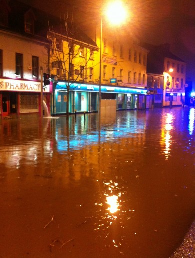 Flash floods and road warnings as heavy rain pours