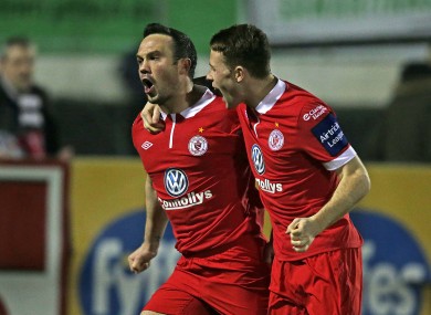 Rafael Cretaro and Lee Lynch celebrate on Tuesday night.