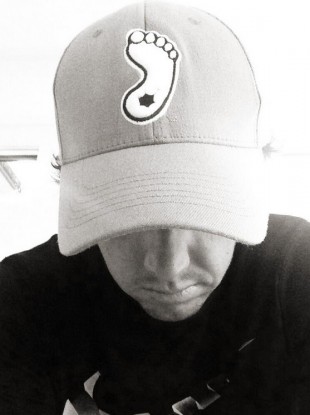 Local hero: McIlroy wears a tar-heel cap in North Carolina this week.